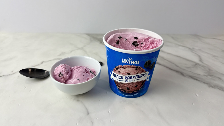 Wawa black raspberry chip ice cream carton and scoop in a bowl with a spoon