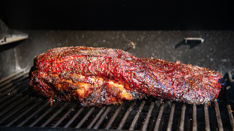 bbq smoked brisket on grill