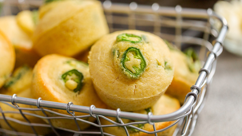 Jalapeño muffins in a metal basket