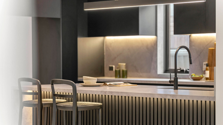 Kitchen with under-cabinet and under-counter lighting