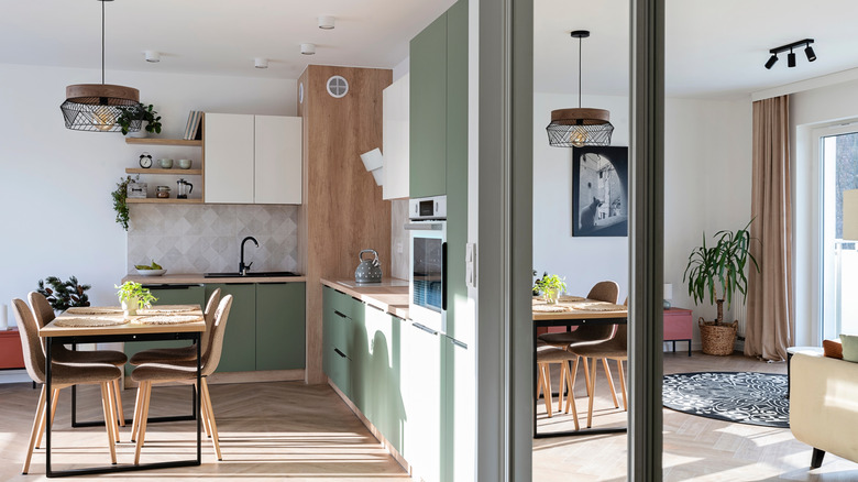 Bright kitchen with floorlength mirror