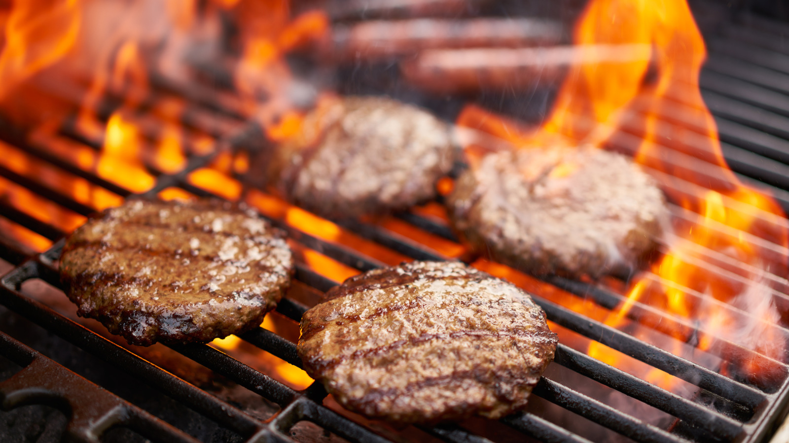 We Asked 5 Chefs For Their Go-To Burger Grilling Tips