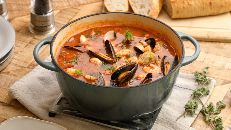 Italian fish and tomato stew in large pot