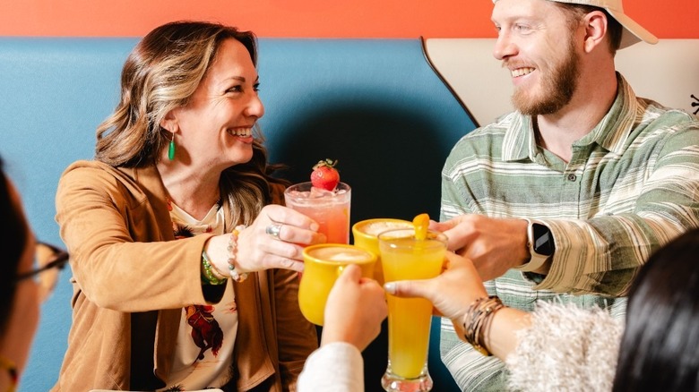 People drinking at a Snooze eatery