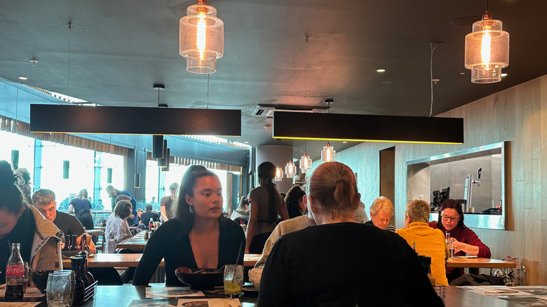 People eating in a Wagamama