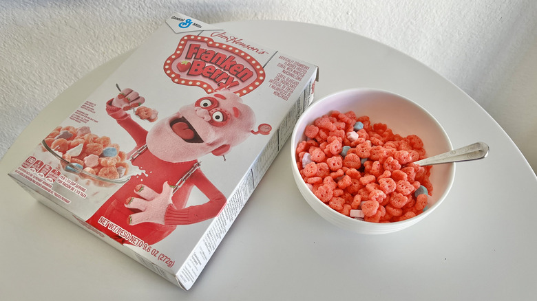 General Mills Franken Berry box and cereal bowl on a white table