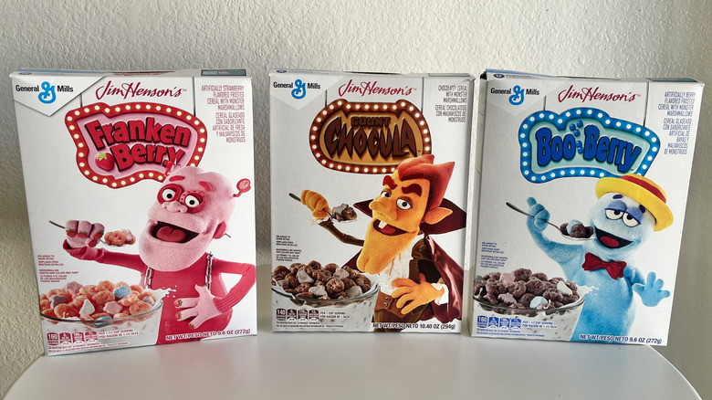 General Mills monster cereal boxes lined up on a table
