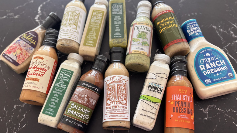 Various Trader Joe's bottled salad dressings on countertop