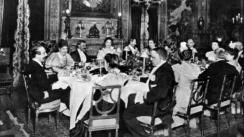 People fine dining at Delmonico's circa 1890