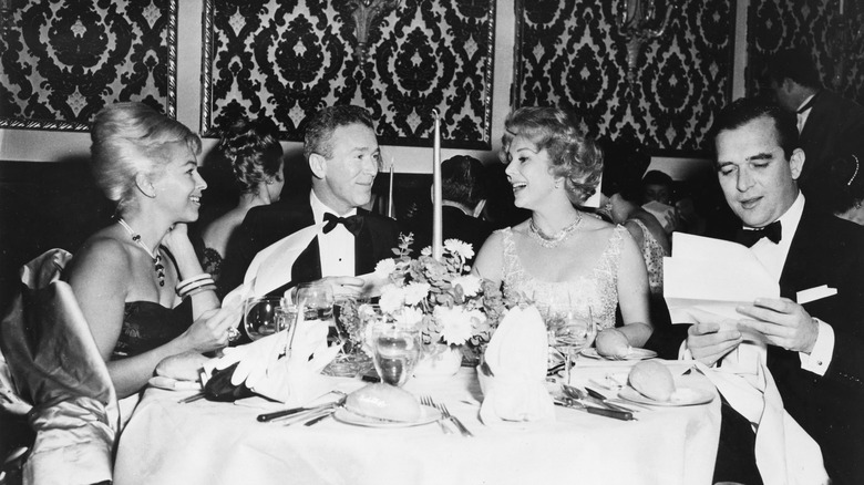 Helayne McNorton, Red Buttons, Eva Gabor, and Richard Brown at Delmonico's