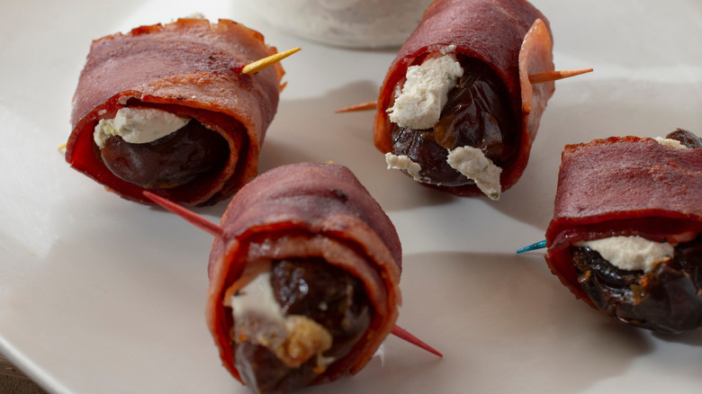 four devils on horseback on a plate