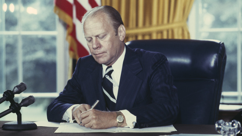 Gerald Ford writing at Resolute Desk