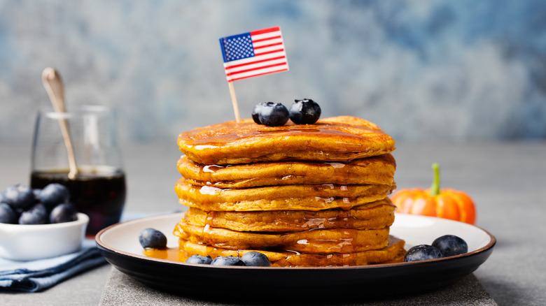 Stack of pancakes with American flag toothpick