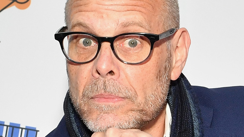 Alton Brown looks surprised with glasses