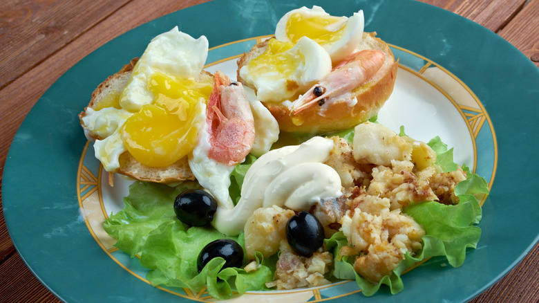 Eggs Neptune with seafood 
