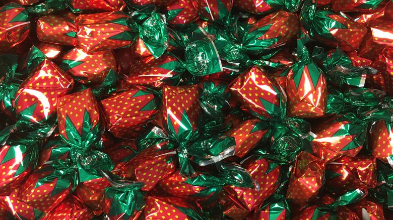 Many wrapped strawberry candies