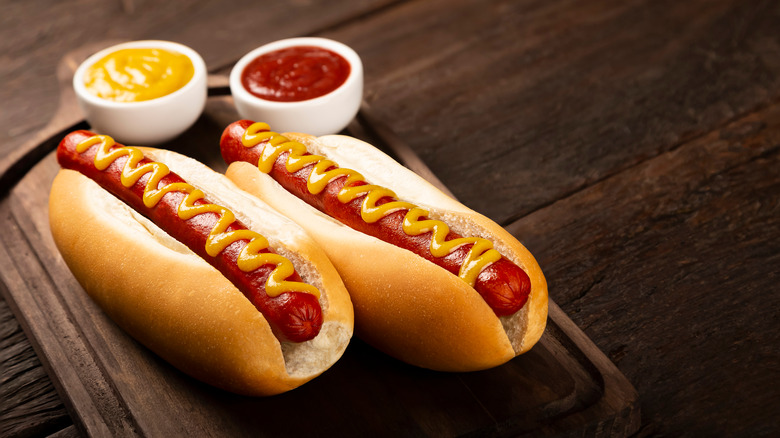 dressed hot dogs with condiments