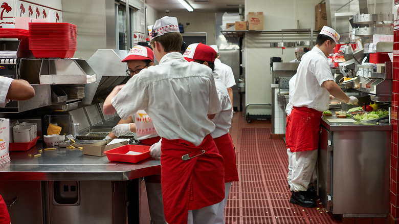 Workers in an In-N-Out kitchen