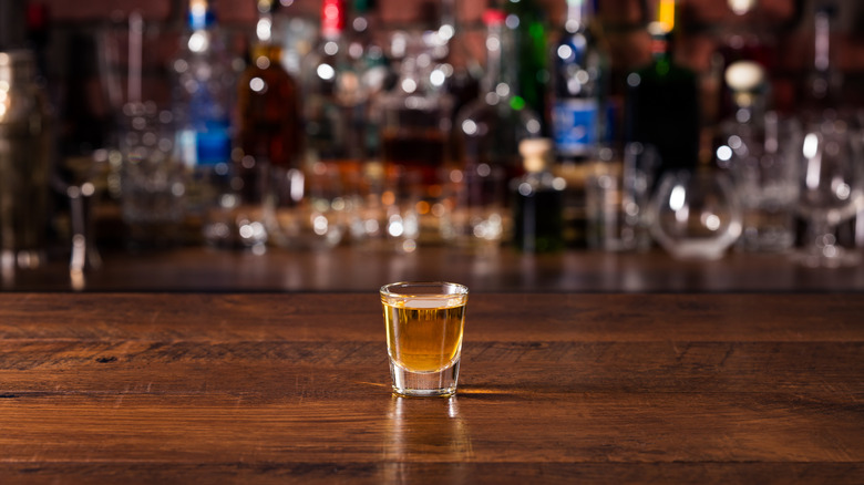 Whiskey shot on a bartop