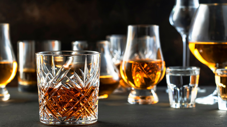 various glasses of whiskey