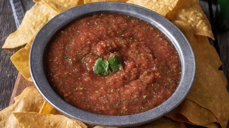 bowl of salsa with chips