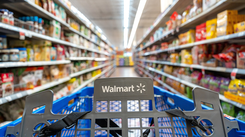 First person view of Walmart shopping cart in snack aisle