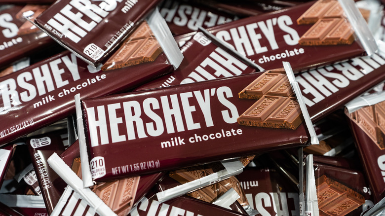 A pile of Hershey Company milk chocolate bars