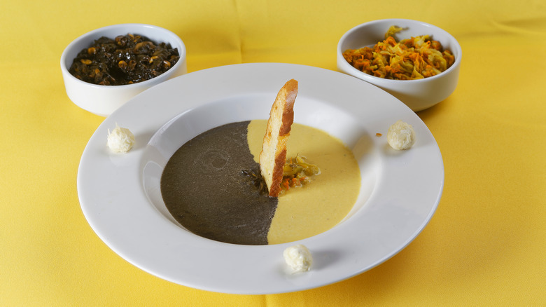 Two-colored pumpkin flower cream and huitlacoche soup