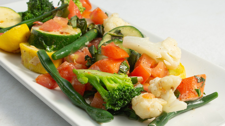 carrots, broccoli, squash, and cauliflower on plate