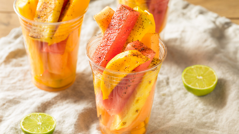 Mexican fruit cups with limes
