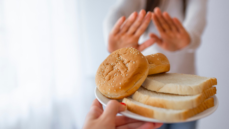 woman shunning bread