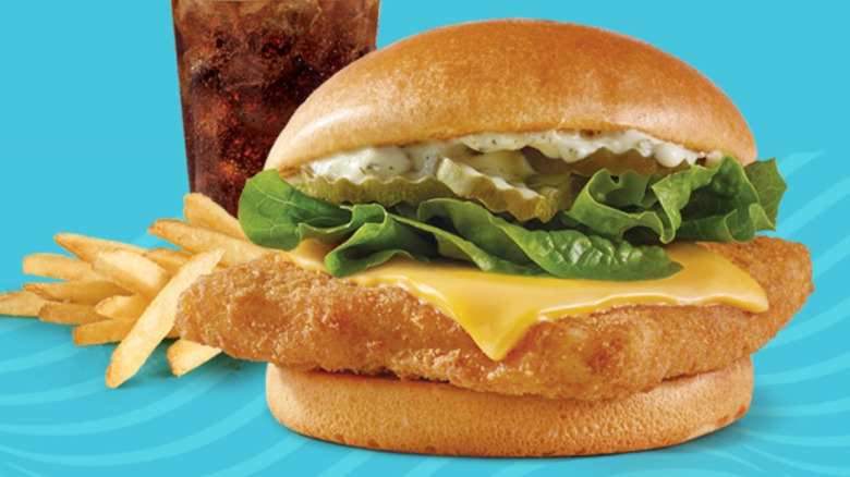 Wendy's Panko Fish Sandwich with a soda and fries behind it