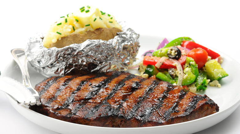steak, salad and baked potato