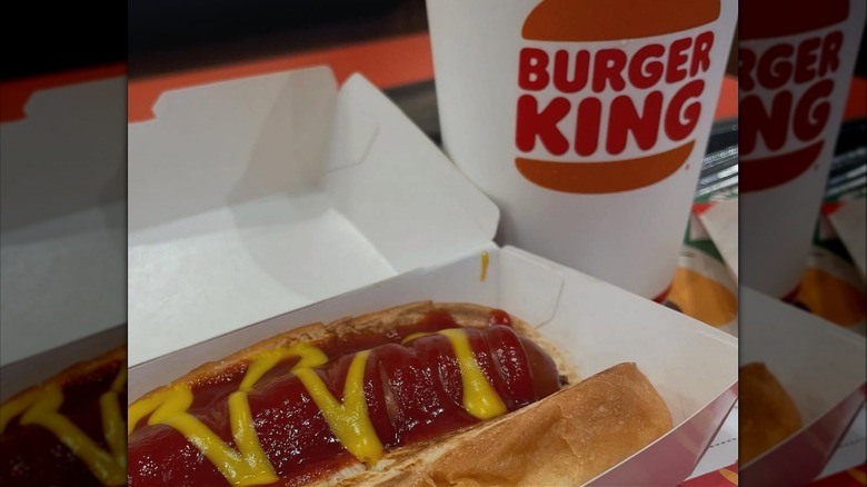 Burger King hot dog with ketchup and mustard in a container.