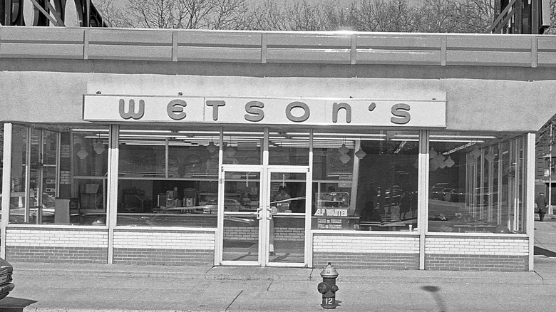A black and white photograph of a Wetson's restaurant