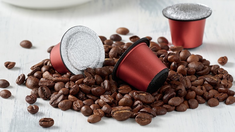 Coffee pods on beans