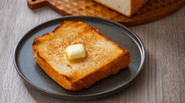 Buttered white bread toast