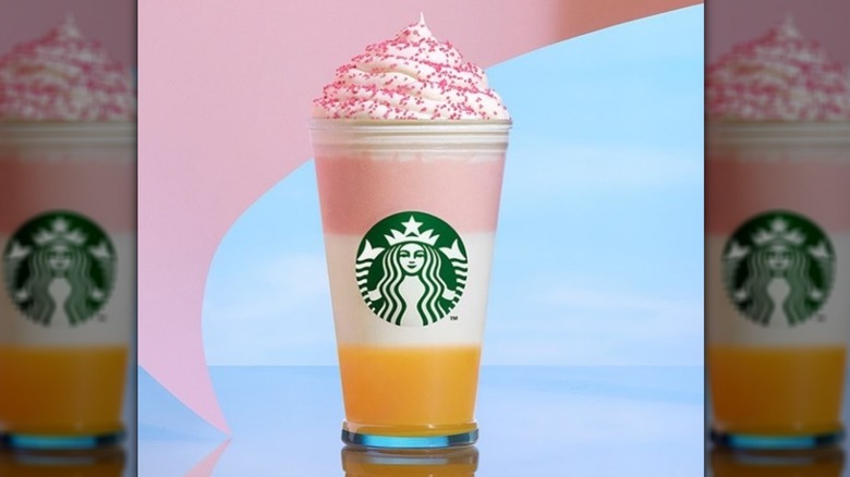 Starbucks-branded cup with a layer of milky white vanilla creme