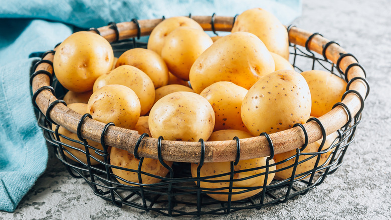 basket of new potatoes on tabletop