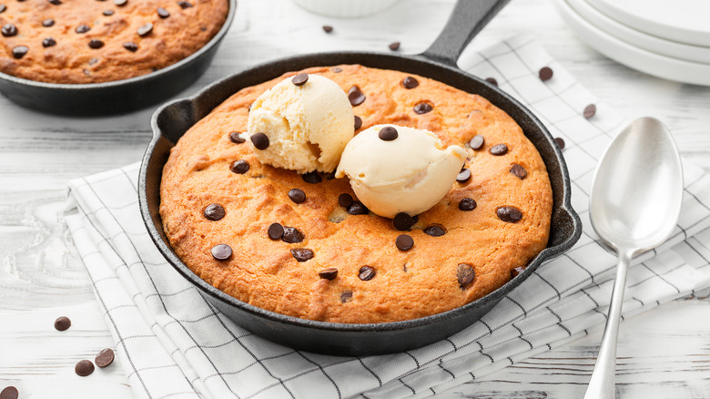 pizookie in skillet with ice cream