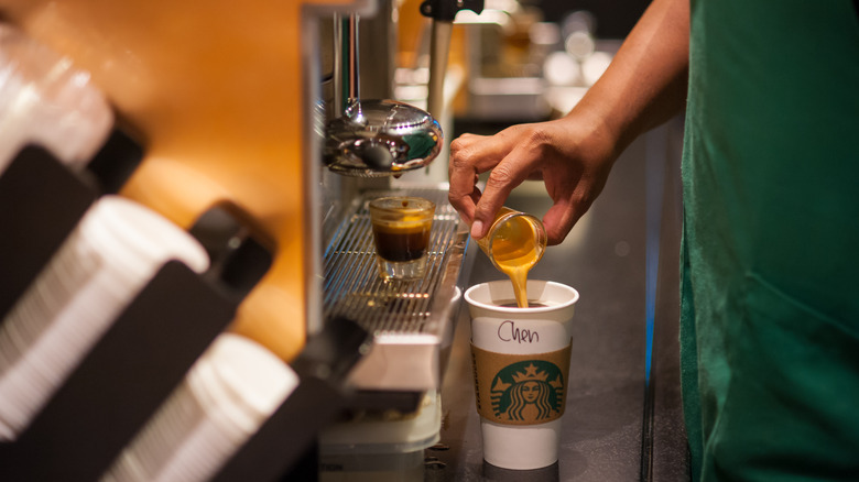 Starbucks barista making espresso