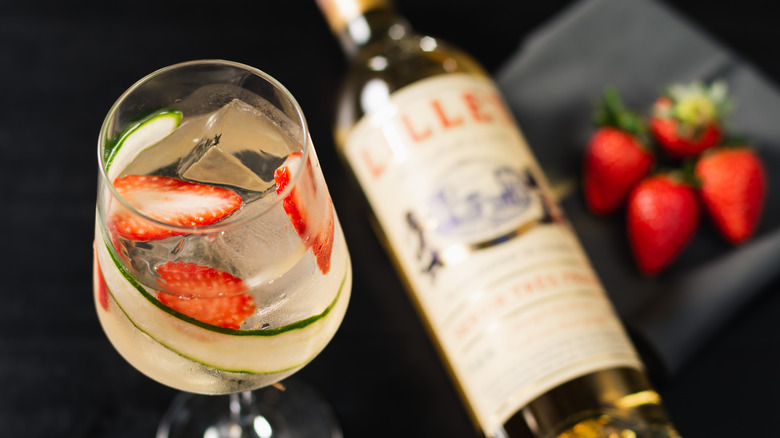 Bottle of Lillet and cocktail