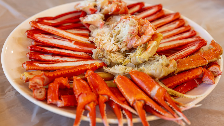 Snow crab legs on white plate