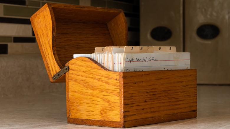 box filled with vintage handwritten recipe cards