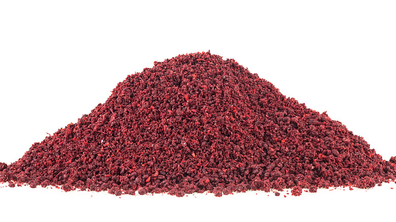 Heap of sumac on white background