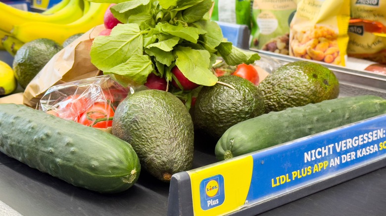 Vegetables on a conveyor belt at Lidl