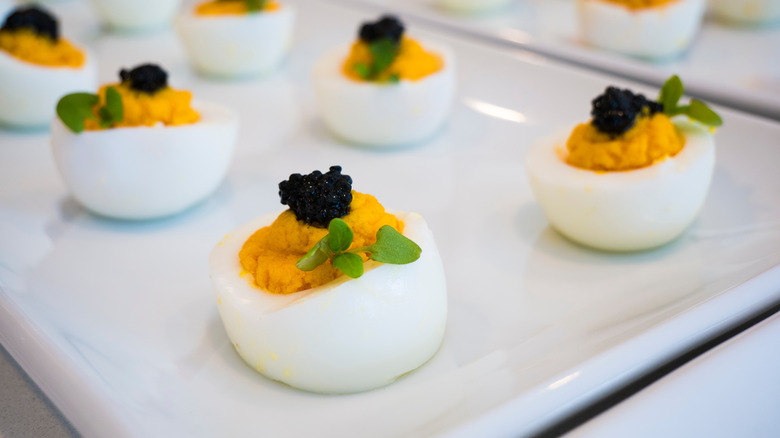 Deviled eggs with caviar