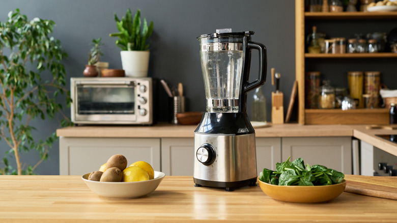 Electric blender standing on a home kitchen counter