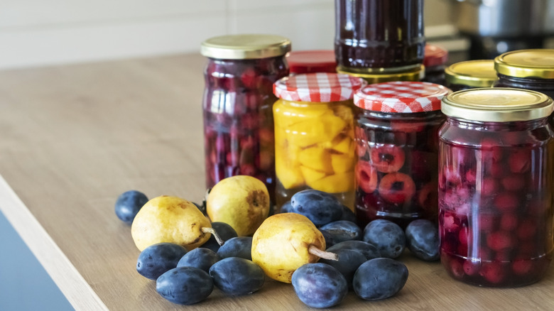 variety of fruits in jars
