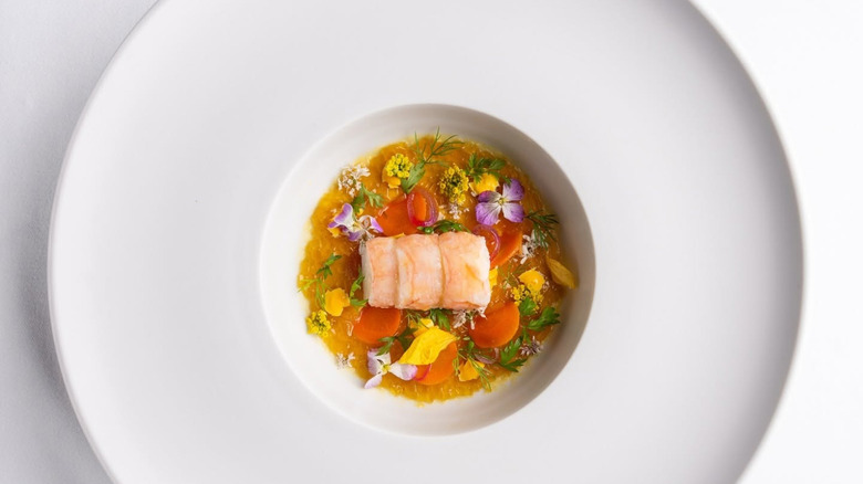 Dish adorned with flowers at Addison
